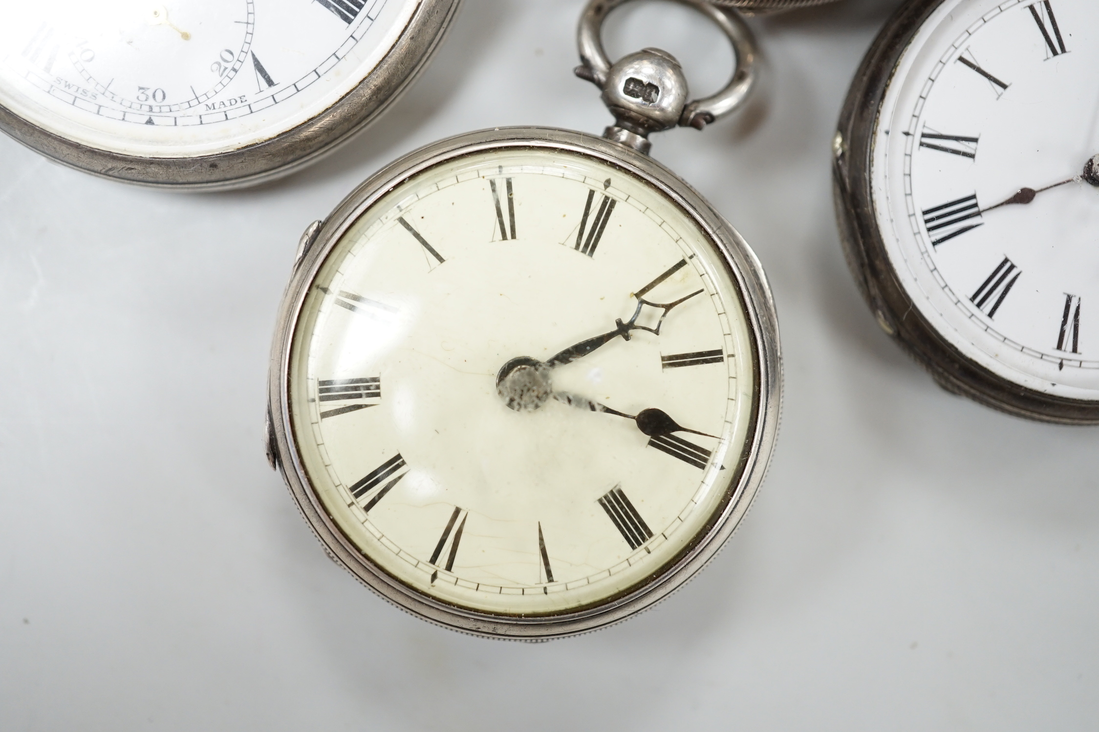 Thirteen assorted pocket and fob watches including silver Exchange and silver J.W. Benson.